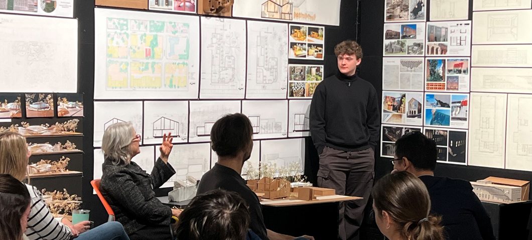 Guest Reviewer, Liane Hancock, critiques ARCH 253 student during Final Studio Review Week, December 1-5, 2025