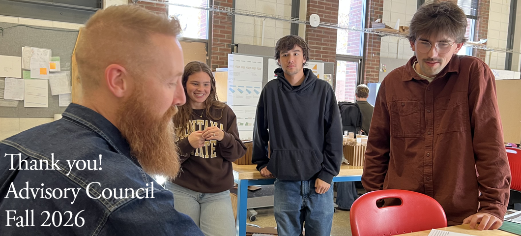 Advisory Council member Nick Diggins meeting with students for a desk critique in Brian Rasch's ARCH 355 studio